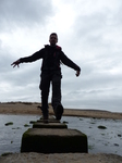 FZ012510 Wouko on stepping stones at Three Cliffs Bay.jpg